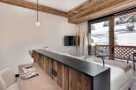 Experience luxury living in this stunning property, featuring a beautifully designed bedroom with a modern aesthetic.