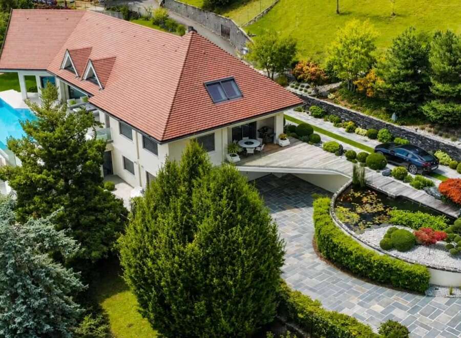 Experience luxury living in this stunning modern home featuring a private infinity pool with breathtaking views.