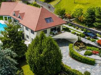 Experience luxury living in this stunning modern home featuring a private infinity pool with breathtaking views.