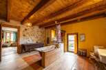 Rustic charm meets modern comfort in this unique bathroom.