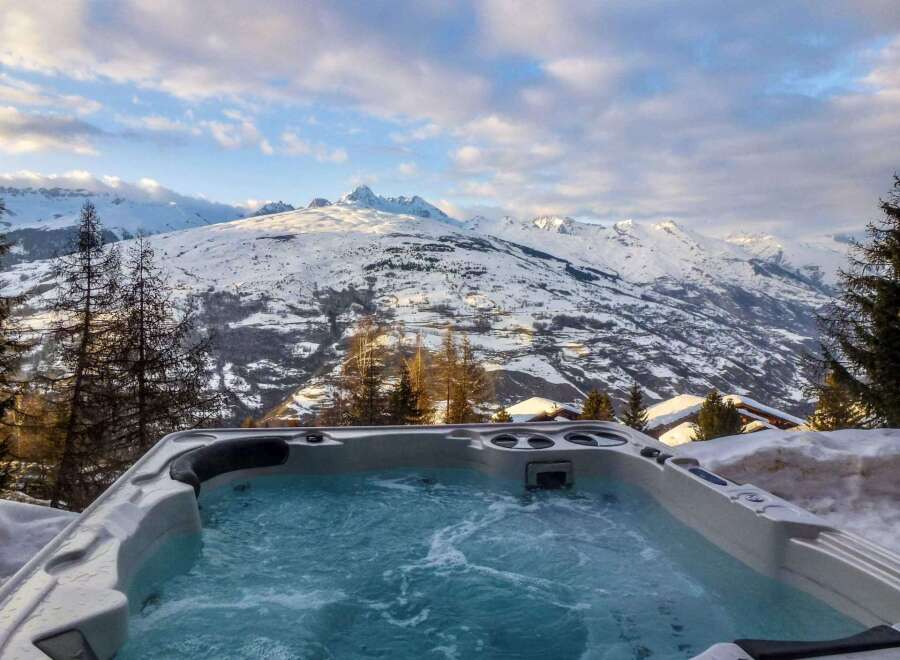 Luxury chalet with breathtaking mountain views and a private hot tub.