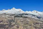Breathtaking mountain views and a charming village nestled in the valley below.