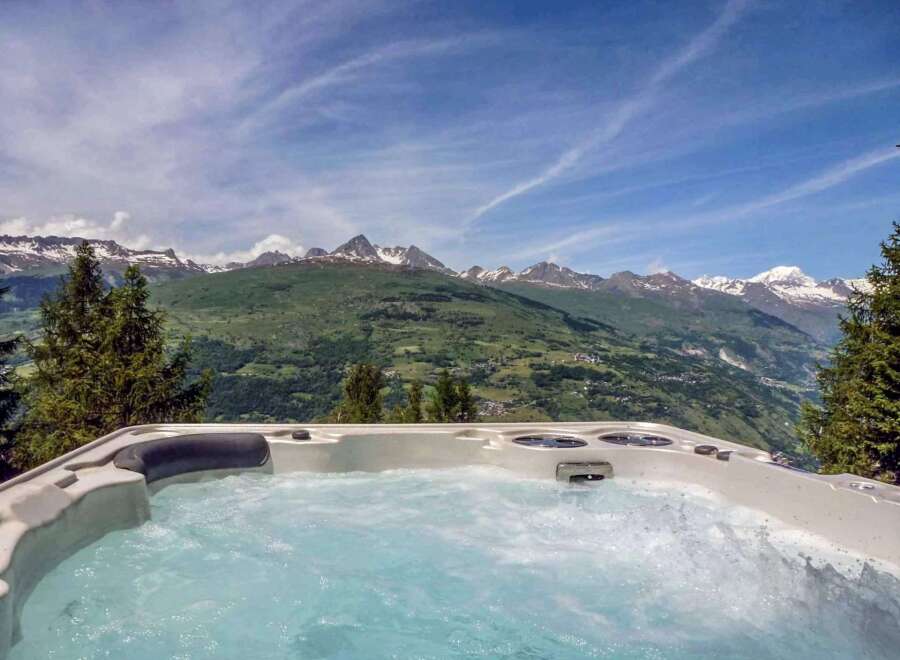 Luxury chalet with breathtaking mountain views and a private hot tub.