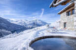 Experience the ultimate winter escape in this stunning mountain retreat.