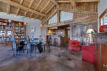 Experience rustic elegance in this stunning property, featuring exposed wooden beams and a cozy ambiance.