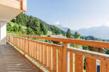 Enjoy breathtaking mountain views from this stunning balcony.