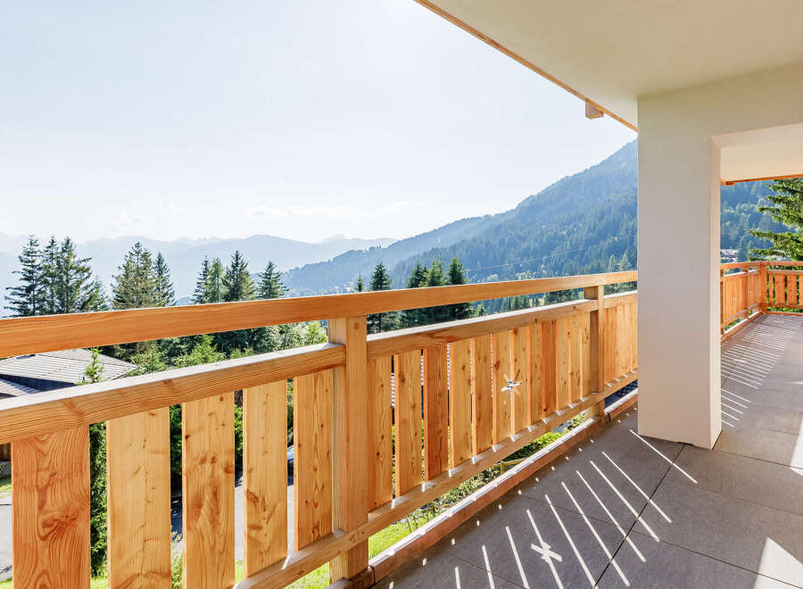 Enjoy breathtaking mountain views from this stunning balcony.