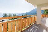 Enjoy breathtaking mountain views from this stunning balcony.