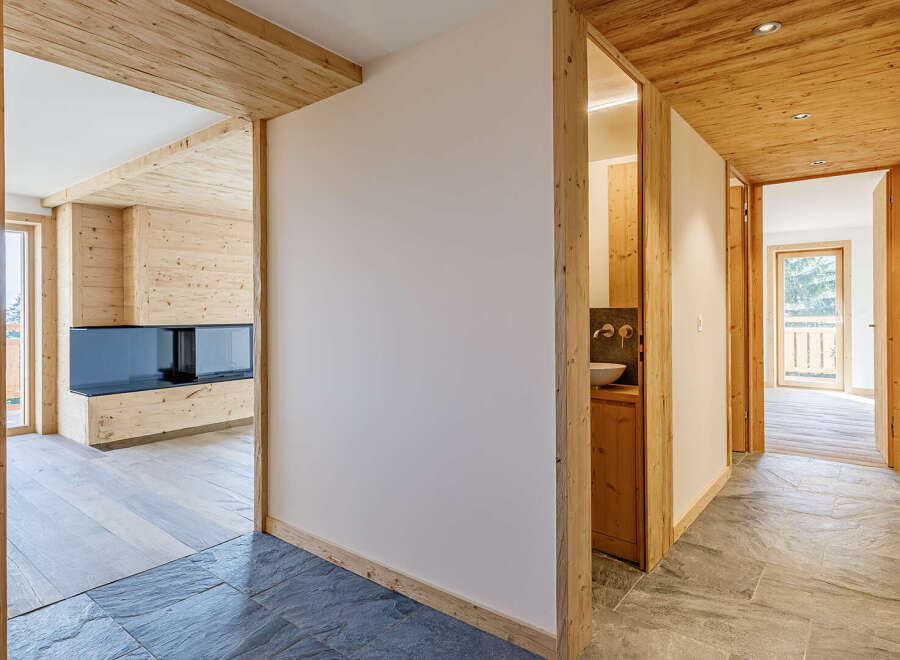 Discover the charm of this stunning property, showcasing exquisite wooden accents throughout.