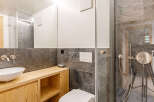 Discover a modern bathroom design featuring a sleek, minimalist aesthetic.