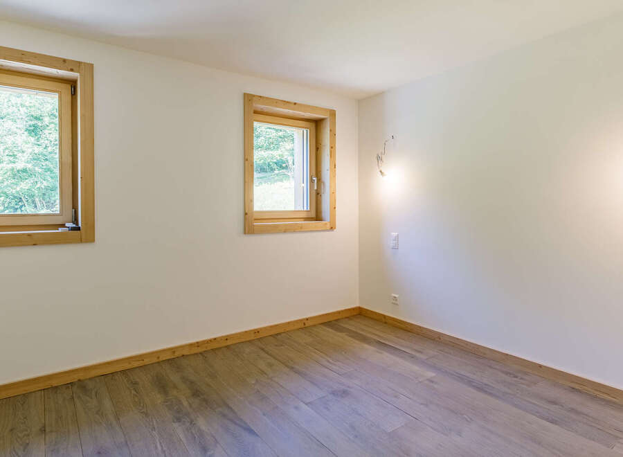 Discover a bright and airy space with natural light flooding through the windows.