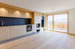 Experience the warmth of this stunning property with its inviting wooden interior.