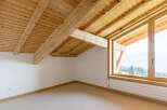 Discover the charm of this stunning attic space, featuring a beautifully crafted wooden ceiling and exposed beams.