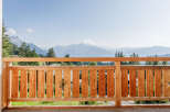 Enjoy breathtaking mountain views from this stunning balcony.