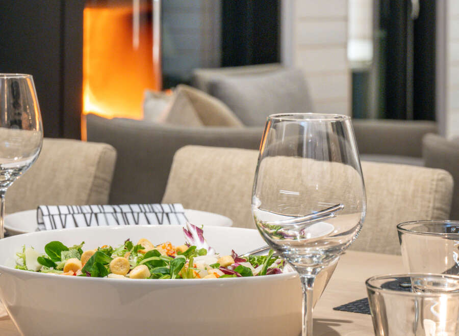 Enjoy a cozy dining experience with this inviting setup.