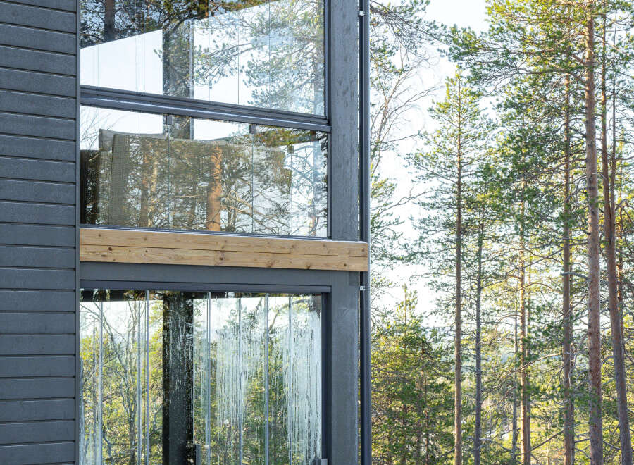 Experience modern luxury in this stunning glass-walled home.