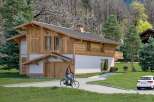 This stunning chalet boasts a unique blend of modern and traditional design, featuring a spacious layout and high-quality finishes.