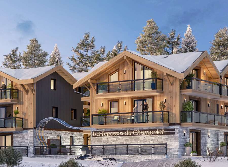 Luxury chalet-style apartments in the French Alps, boasting stunning mountain views and spacious balconies.