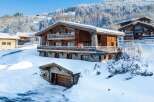 Experience the ultimate winter escape in this stunning chalet nestled in a snowy paradise.