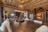 Experience luxury living in this stunning chalet, featuring exquisite wooden interiors and a cozy ambiance.