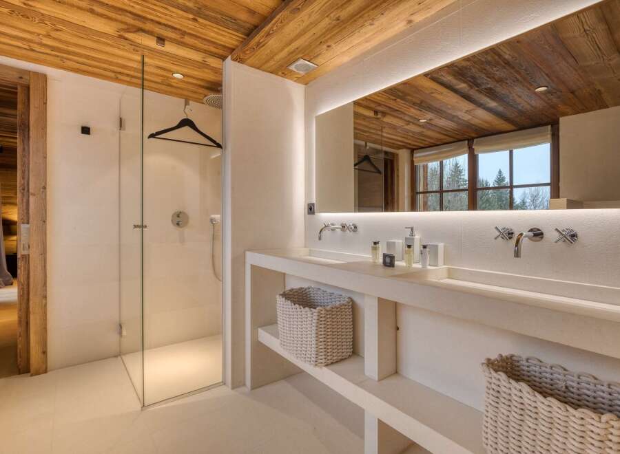 Experience luxury in this stunning bathroom featuring a sleek, modern design.