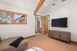 This stunning property boasts a spacious and bright living area with large windows offering breathtaking views.