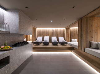 Relax and rejuvenate in our luxurious spa, featuring a tranquil relaxation area with comfortable loungers and a soothing atmosphere.