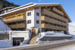 This stunning chalet boasts multiple levels with private balconies, offering breathtaking mountain views.