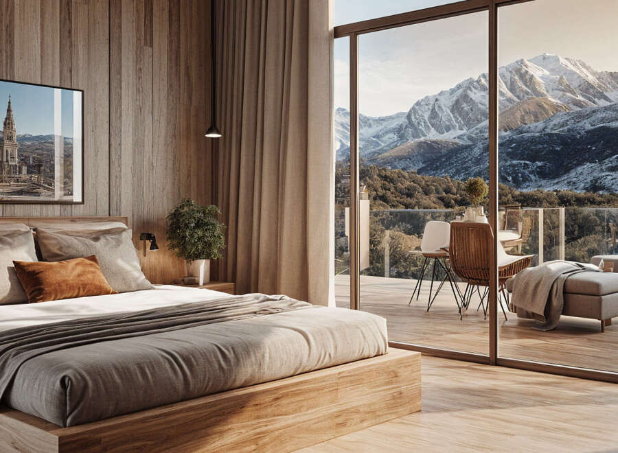 Wake up to breathtaking mountain views from this luxurious bedroom.
