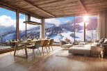This stunning chalet boasts breathtaking panoramic views of a snow-covered mountain range, visible through expansive floor-to-ceiling windows.