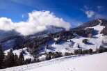 Nestled in a breathtaking snowy mountain range, this idyllic ski resort offers stunning views and pristine slopes.