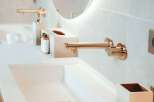 Indulge in the luxurious bathroom featuring a sleek, modern design.