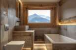 Luxury bathroom with mountain views.