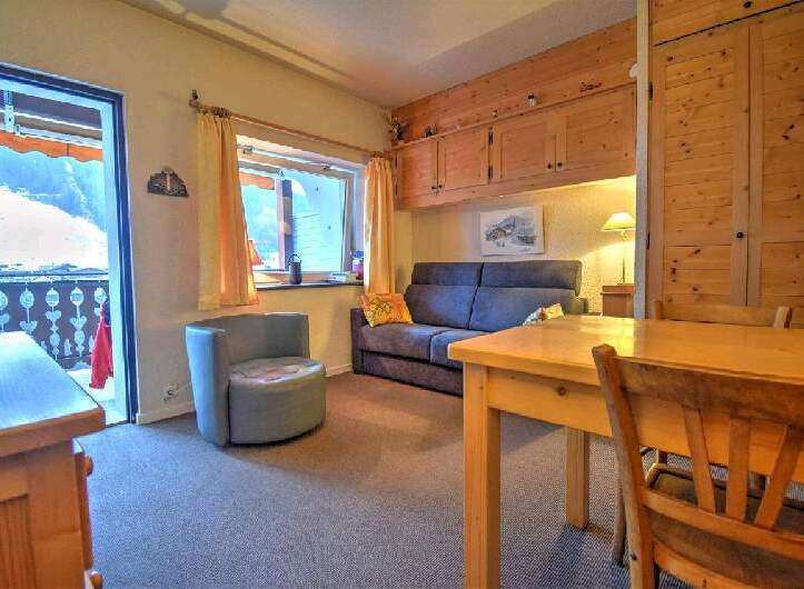 Cozy chalet apartment with stunning mountain views.