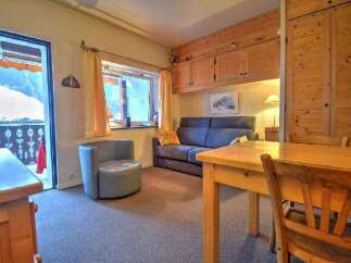 Cozy chalet apartment with stunning mountain views.