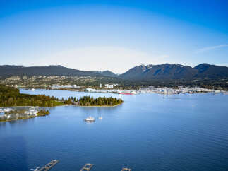 Stunning waterfront property with breathtaking views of the mountains and ocean.