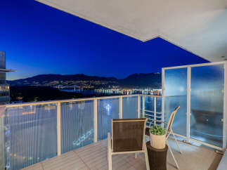 Enjoy breathtaking city and mountain views from this stunning balcony.