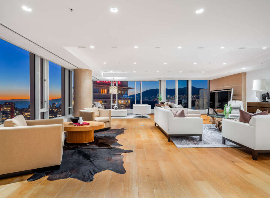 Experience luxury living in this stunning high-rise condo with breathtaking city and mountain views.