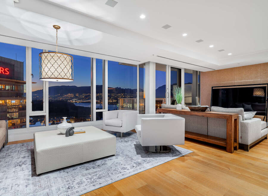 Experience luxury living with breathtaking city and mountain views from this stunning property.