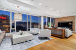 Experience luxury living with breathtaking city and mountain views from this stunning property.