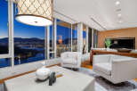 Experience luxury living with breathtaking city and water views from this stunning property.