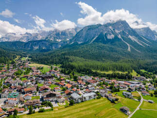Nestled in a picturesque valley, this stunning property offers breathtaking views of the majestic Alps.