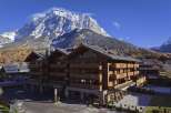 Discover mountain view suites with private balconies at this hotel.