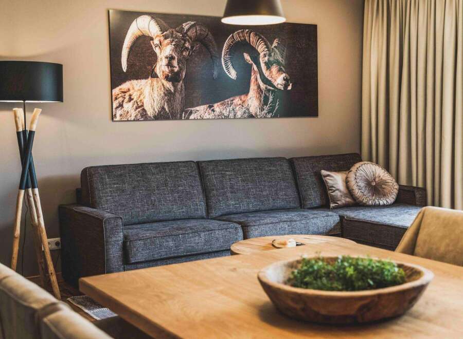 This inviting living space boasts a comfortable gray sectional sofa perfect for relaxation and entertaining.