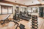 This property boasts a well-equipped fitness center, complete with treadmills, elliptical machines, and weight training equipment.