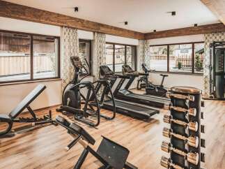 This property boasts a well-equipped fitness center, complete with treadmills, elliptical machines, and weight training equipment.
