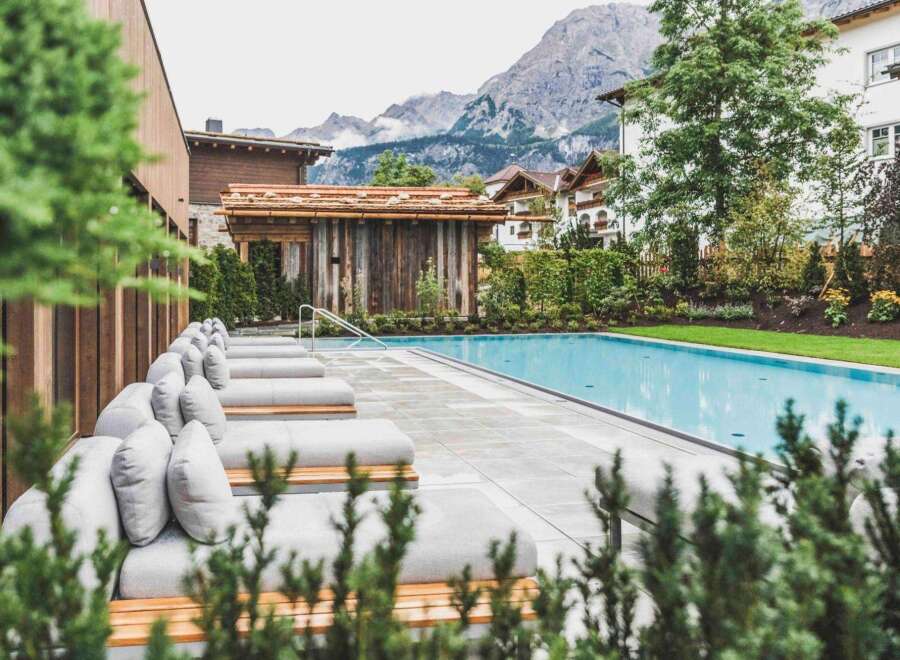 Discover a luxury real estate gem with a stunning outdoor pool and mountain views.