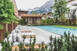 Discover a luxury real estate gem with a stunning outdoor pool and mountain views.