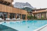 Experience luxury living with this stunning real estate featuring a pristine pool and breathtaking mountain views.