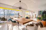 Stunning lake view apartment with a spacious open-plan living area.